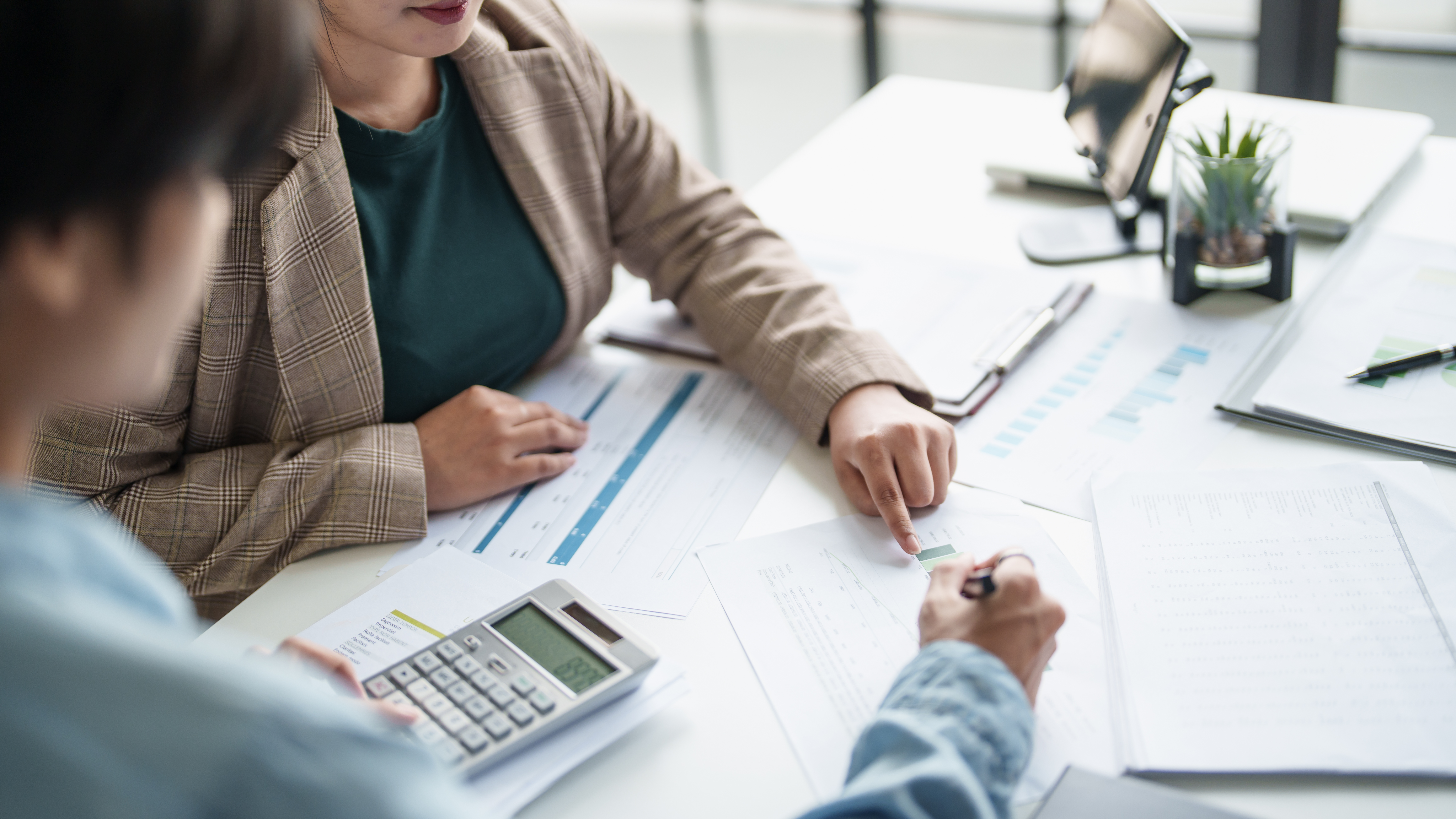 business man Auditor or internal revenue service staff checking annual financial statements company Audit Â Accounting tax